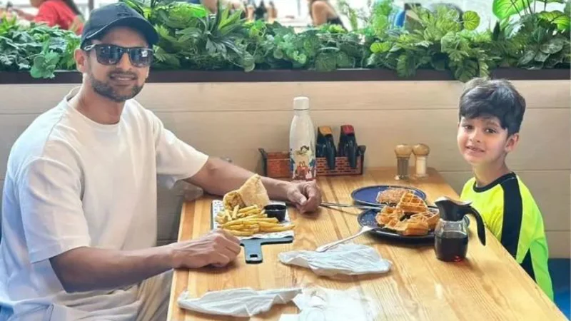 Shoaib Malik and his Son