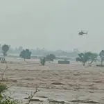 Pakistan Army rescues flood-trapped family via helicopter