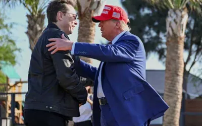 Trump pledges to buy a Tesla to support Elon Musk amid protests