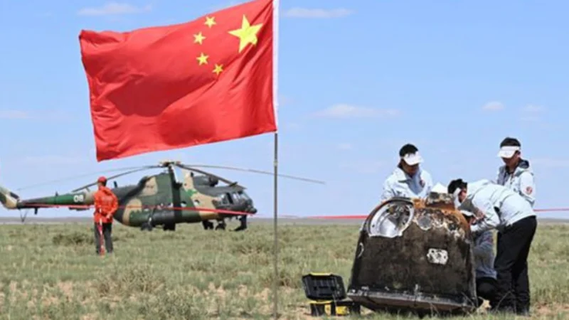 China's space probe returns with rare moon rocks