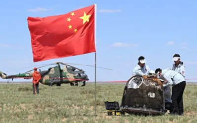 China's space probe returns with rare moon rocks