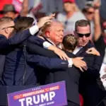 Donald Trump injured in election rally shooting, assailant killed