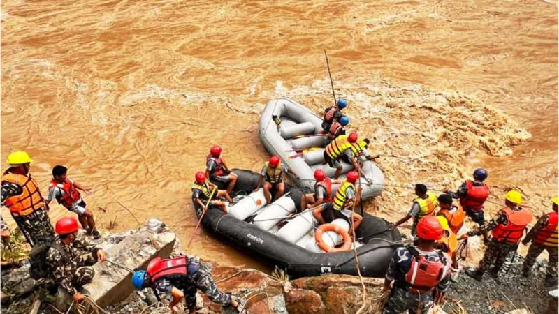 Nepal landslide: Rescuers retrieve 11 bodies after two buses swept into River