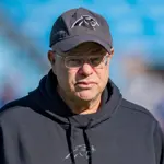 NFL slams Panthers owner with hefty fine for fan beverage toss