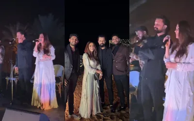 Hadiqa Kiani and Atif Aslam singing together on stage in Dubai at New Year
