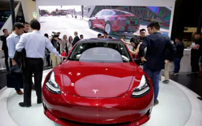 Tesla introduces restyled Model 3 sedan