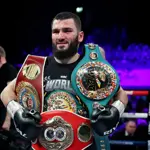 Beterbiev stops Smith in seventh round to retain light-heavyweight titles