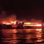 Philippine ferry fire leaves five dead, dozens missing