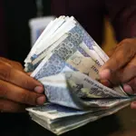 Pakistan’s central bank holds key interest rate at 11.5% despite surging inflation