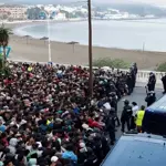 Spain launches Ceuta beach sweep as police confront migrants