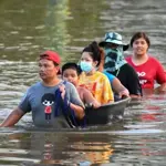 Heavy rain triggers flooding in Bangkok, forces evacuations