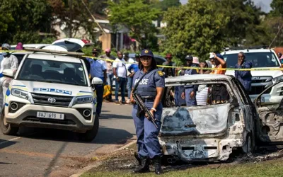 South Africa police hunt gunmen after 27 killed in tavern shootings