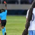Footballer’s ankle-length hair causes trouble for opponents