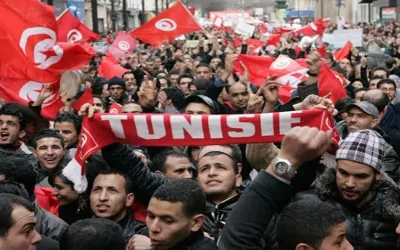Arab Spring slogans echo across Tunisia as thousands demand president's resignation