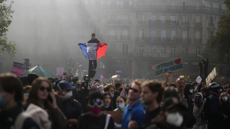 Clashes erupt after hundreds of thousands protest across France