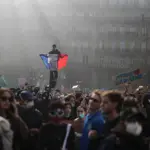 Clashes erupt after hundreds of thousands protest across France