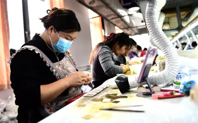 China's industrial profits surge 14.4% in September as AI boom offsets weak consumer demand