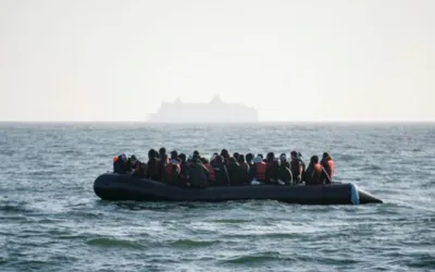 Britain faces surge as 700 migrants cross the channel in small boats