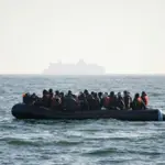 Britain faces surge as 700 migrants cross the channel in small boats