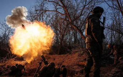 Russian soldiers charged in murder of pro-Moscow U.S. fighter