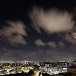 Iran launched a barrage of ballistic missiles at Israel in response to actions against Hezbollah