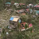 Philippines cleans up as typhoon death toll rises