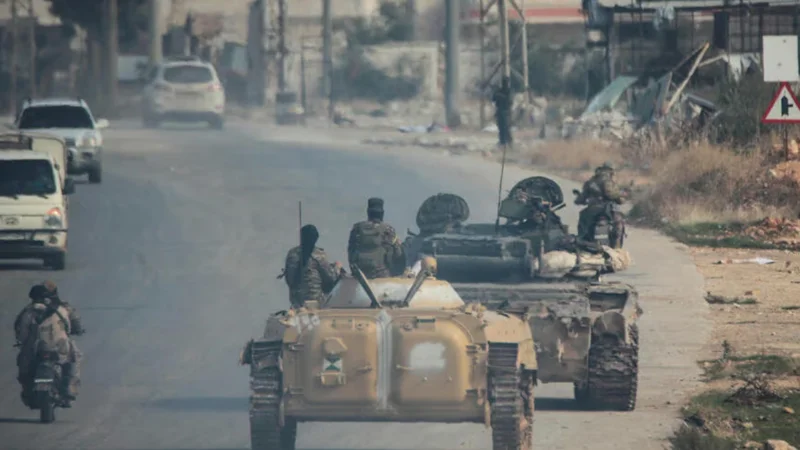 Syrian rebels sweep into Aleppo, army closes airport and roads