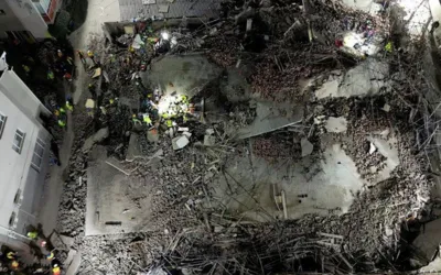 South Africa: Rescuers make contact with 11 people in collapsed building