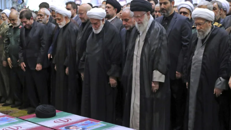 Supreme leader of Iran leads prayers at Raisi's funeral procession