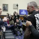Chaos at Capitol hearing as former officer confronts with Ivan Raiklin