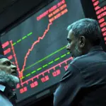 Stock market soars to record high, Dollar falls against rupee