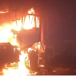 Two siblings killed in Karachi, mob torches seven dumpers